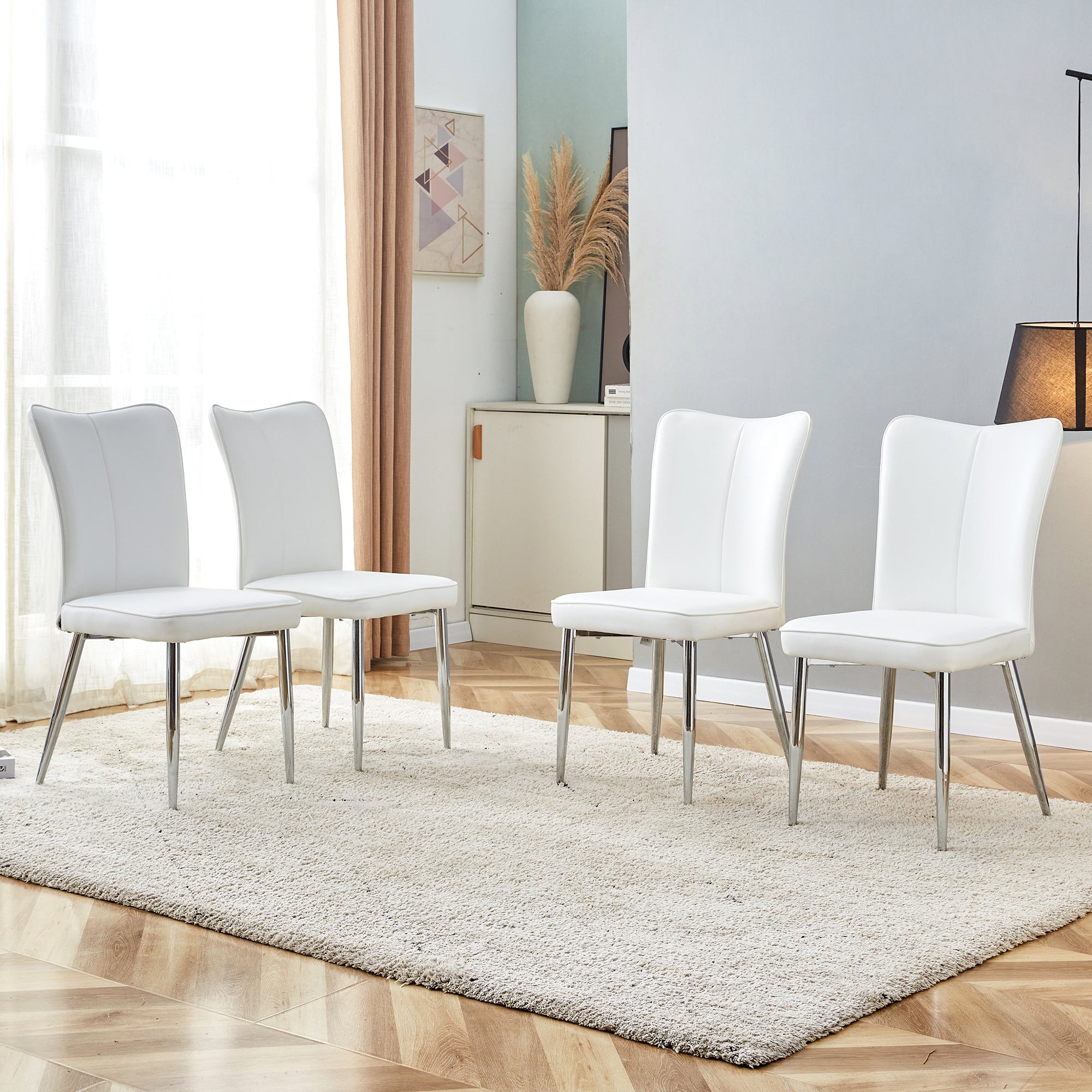 Modern minimalist dining chairs, office chairs. 4-piece set of white PU seats with silver metal legs. Suitable for restaurants, living rooms, and offices. image 1
